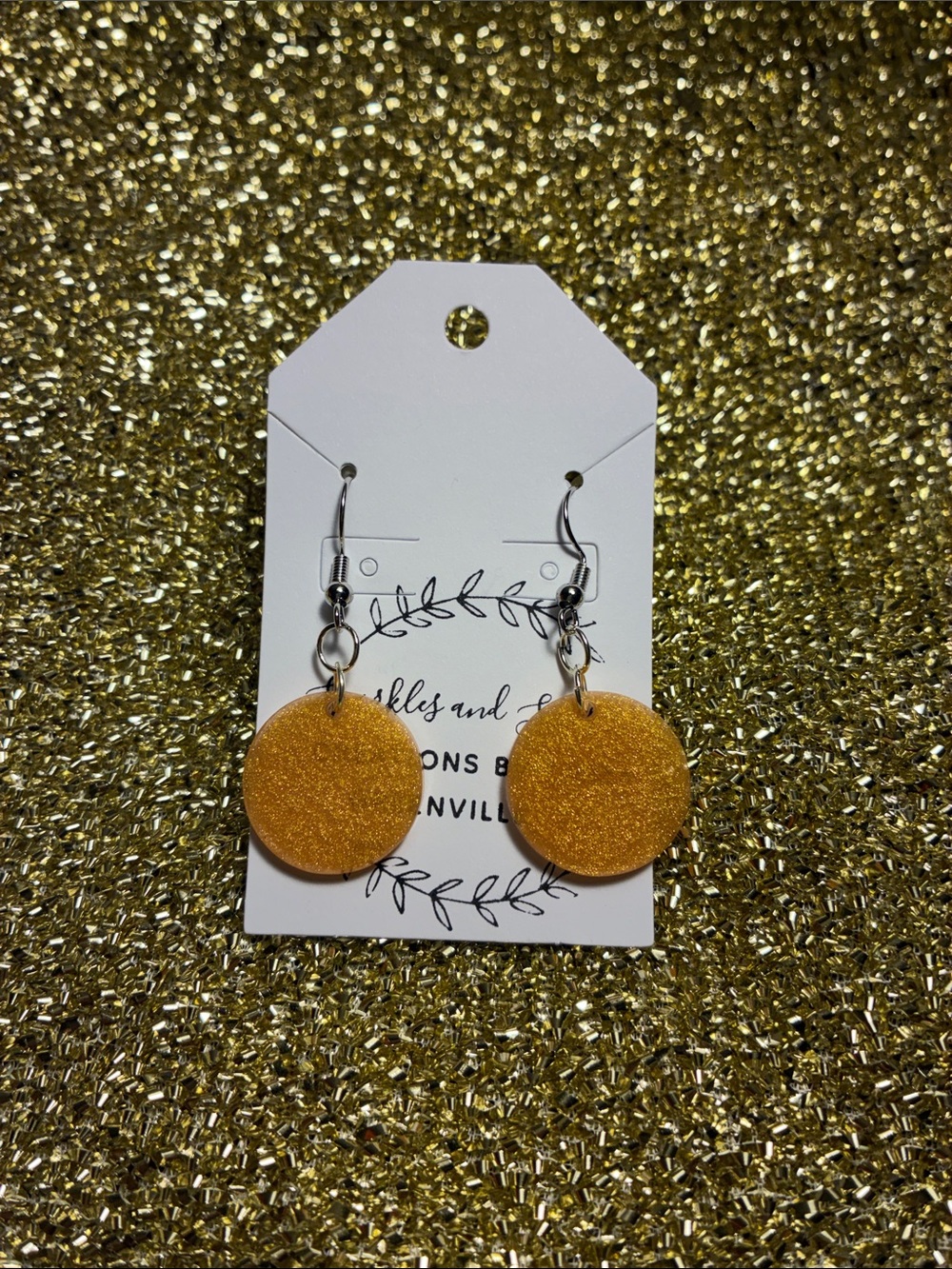Gold circular earrings